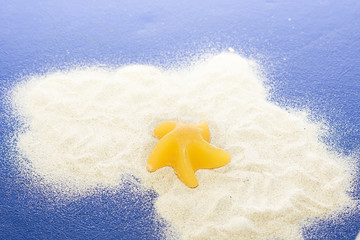 Obraz premium Star and sand.