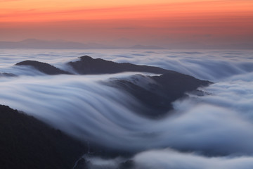 Amazing wave formed by a cloudsea at sunrise in Aralar Mountains (Navarre, Spain)