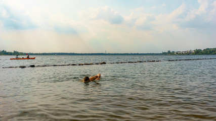 Man swimming in open water