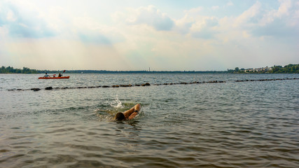 Man swimming in open water