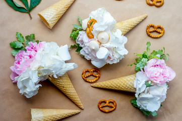 bouquets of peonies in a waffle cone