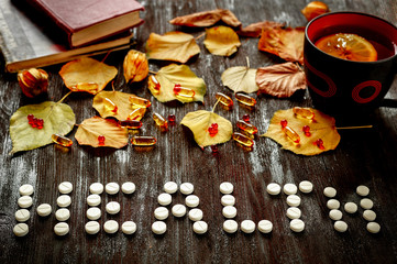 concept health - treatment with hot tea and medecine