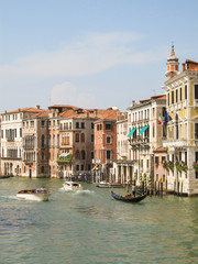 Gondolas and historic buildings in the Gran Canal in Venice, Italy