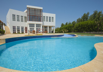 Swimming pool at at luxury tropical holiday villa