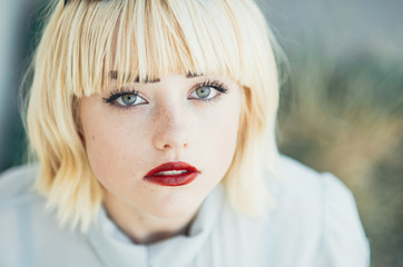 Closeup portrait of young beautiful blonde