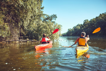 Fototapeta na wymiar A canoe trip on the river in the summer.