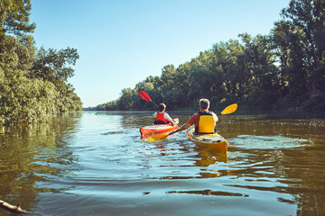 A canoe trip on the river in the summer. © Bondariev Volodymyr.
