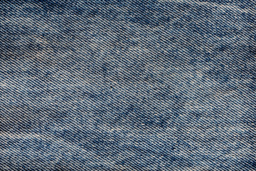 Texture of blue denim fabric, vintage grunge background