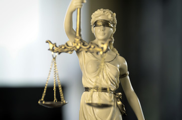 Obraz premium Legal office of lawyer. legal model statue of Themis goddess of justice.