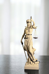Legal office of lawyer.  legal  model statue of Themis goddess of justice.