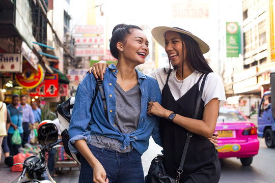 Girlfriends are hanging out on the street in chinatown, Bangkok