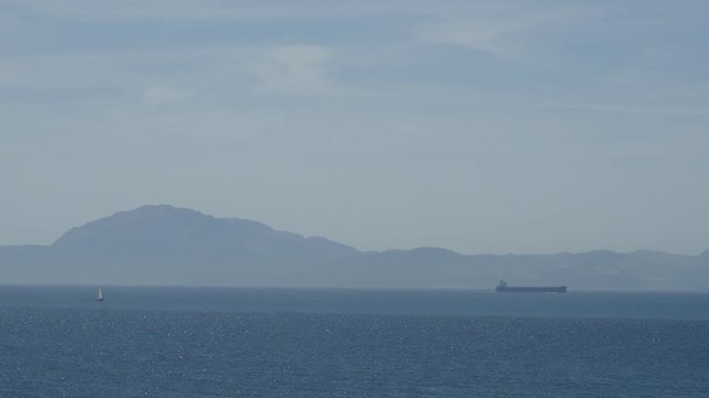 View of Morocco through the Strait of Gibraltar from observation deck of Tarifa city, Spain