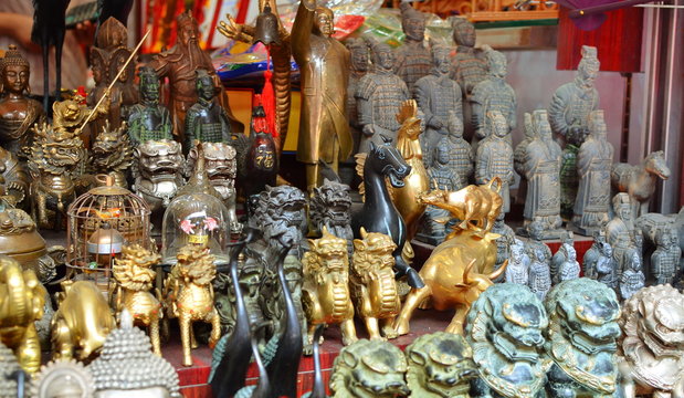Chinese souvenirs. Various asian figures in the gift shop in Shanghai