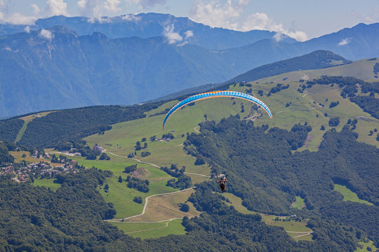 Paragliding above gorgeous mountain Garda Lake, start is from mount  Monte Baldo, Italy