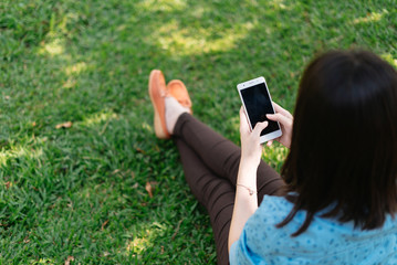 Beautiful woman using her cellphone.