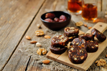 Dates and nuts roll. Indian sweets. Khajoor Katri