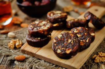 Dates and nuts roll. Indian sweets. Khajoor Katri