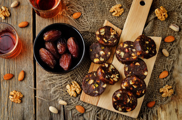 Dates and nuts roll. Indian sweets. Khajoor Katri