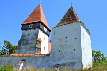 Fortified medieval saxon church in the village Merghindeal- Mergenthal, Transylvania, Romania
The...