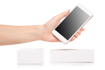 Female hand holding a mobile phone smartphone box