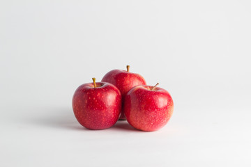 close-up of  red apples on a white background