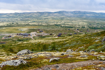 Fototapeta na wymiar View over Vasstulan mountain region in Norway on cloudy summer day.