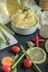 Mashed potatoes in blue bowl.