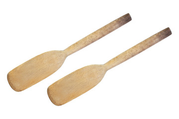 two old cooking wood paddles isolated on white