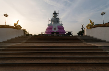 Fototapeta premium White Buddha on sunset sky,Buddhas of Buddhists in Thailand