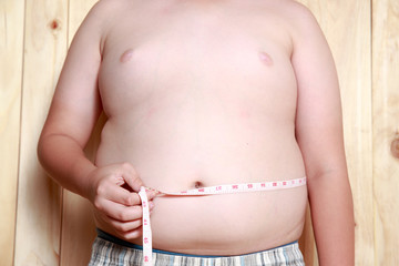 The size of stomach of children with overweight.