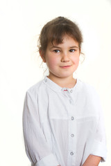studio portrait of young happy smiling preschooller girl over white background