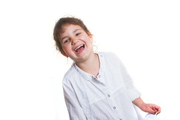 studio portrait of young happy smiling preschooller girl over white background