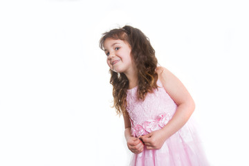 studio portrait of young happy smiling preschooller girl over white background