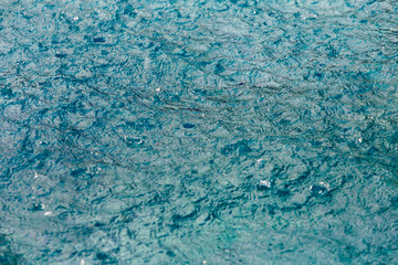 Hotel swimming pool with raining