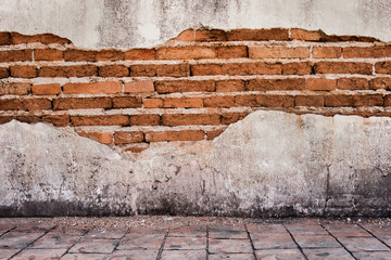 grunge background, red brick wall texture bright plaster wall and blocks road sidewalk abandoned exterior urban background for your concept or project.
