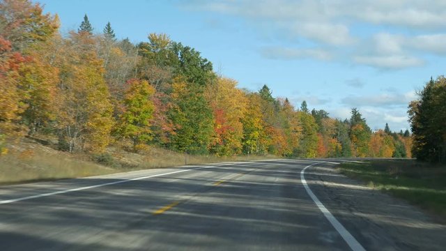 Driving POV in Autumn on M-77 (Michigan state route 77) in  Alger County, Upper Peninsula, Michigan.