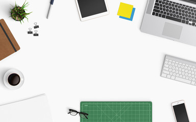 Modern workspace with laptop, coffee cup, keyboard, cutting mat and smartphone copy space on color...