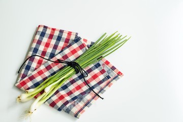 Green onion and root isolated on the white background