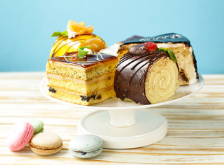 Assorted mini cakes sweet dessert, chocolate and fruit