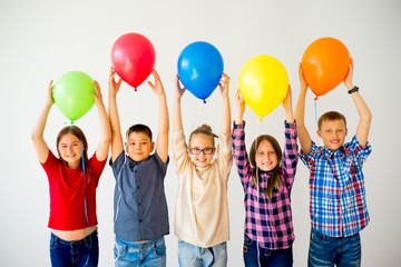 Happy children with balloons - 169641883