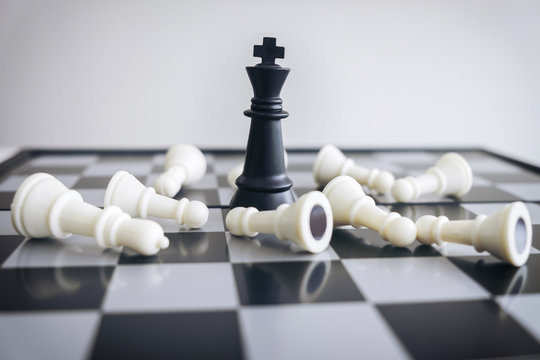 Chess leadership and success concept, chess save the strategy and king on chess board