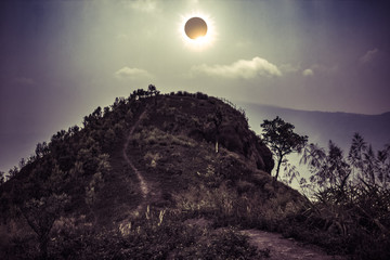 Scientific natural phenomenon. Total solar eclipse glowing on sky.