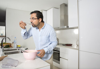 arab man tasting pancake mix