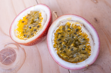 Passion fruits on wooden background.  as package design element
