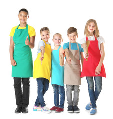 Obraz premium Group of children on white background. Concept of cooking classes