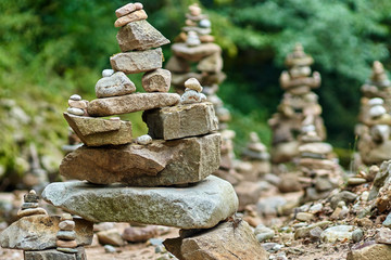 Fototapeta premium Stones arranged zen-like by the river