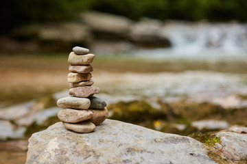 Stones arranged zen-like by the river