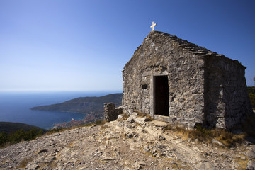 Fototapeta na wymiar Old chapel on Holy Ghost (Sveti Duh) hill above Komiza, Croatia
