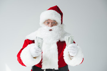 santa with dollar banknotes