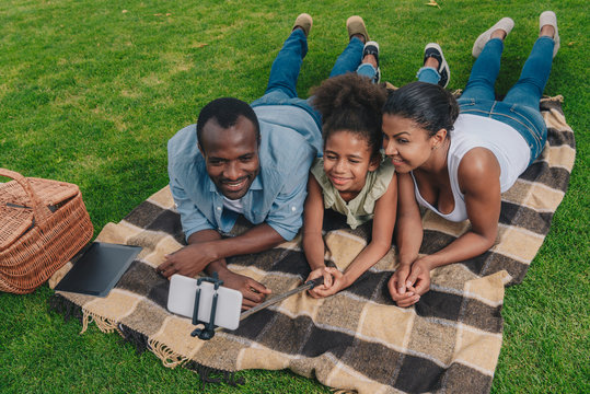 Family Taking Selfie At Picnic